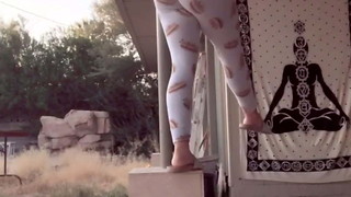 She got on a pillar in backyard