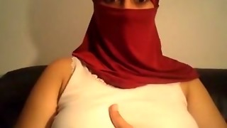Hijab wearing lady demonstrates tits, bootie and fuckbox